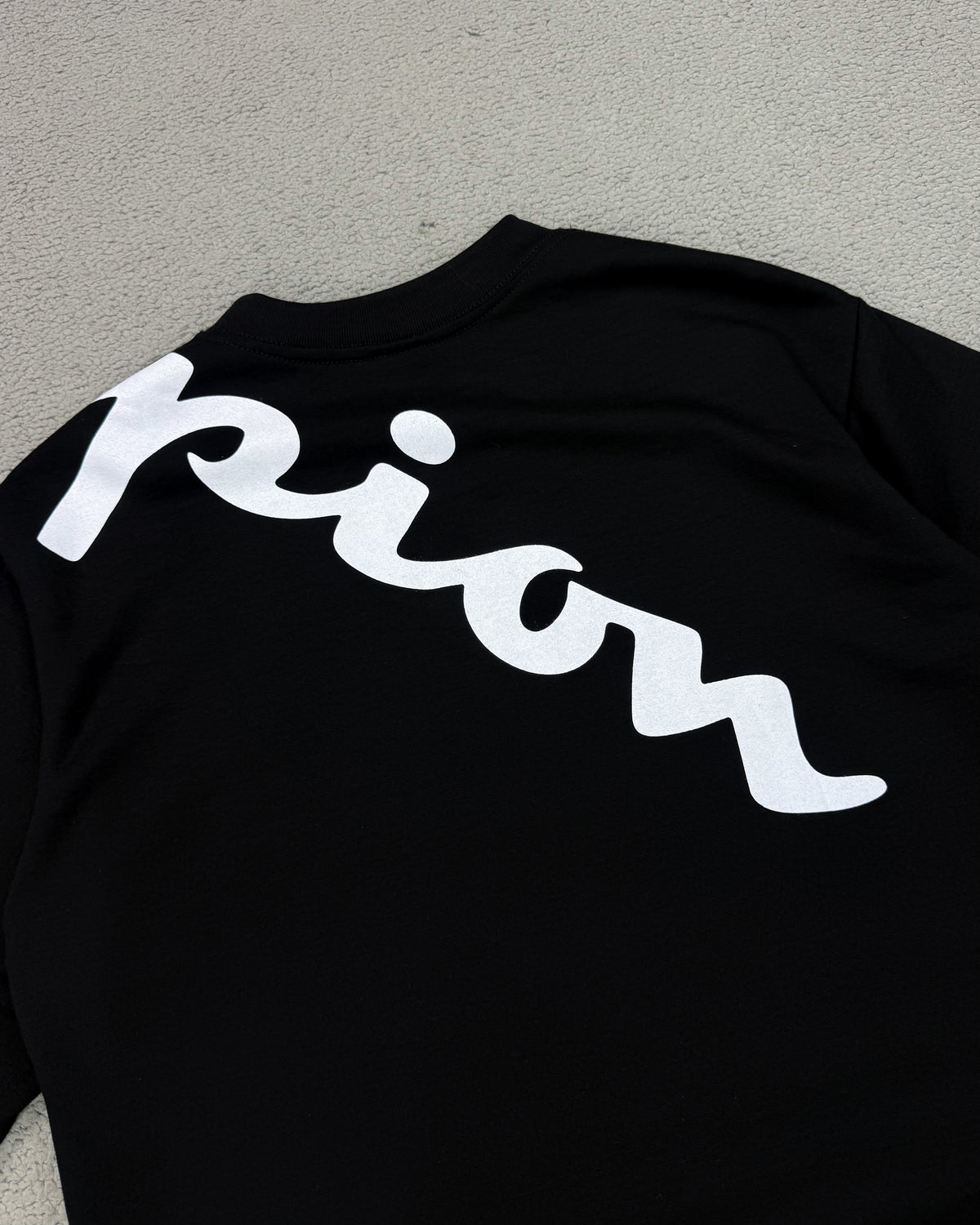 CAMISETA OVERSIZED CHAMP LETREIRO