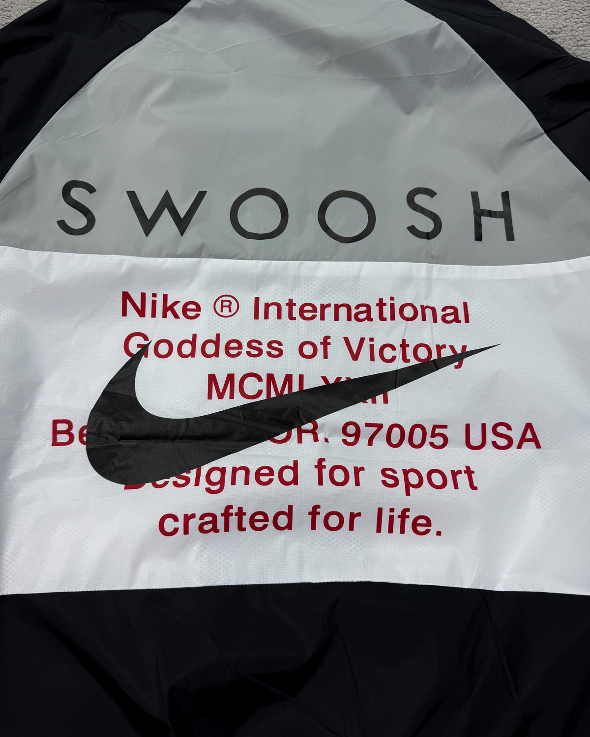 CORTA VENTO NK DOUBLE SWOOSH