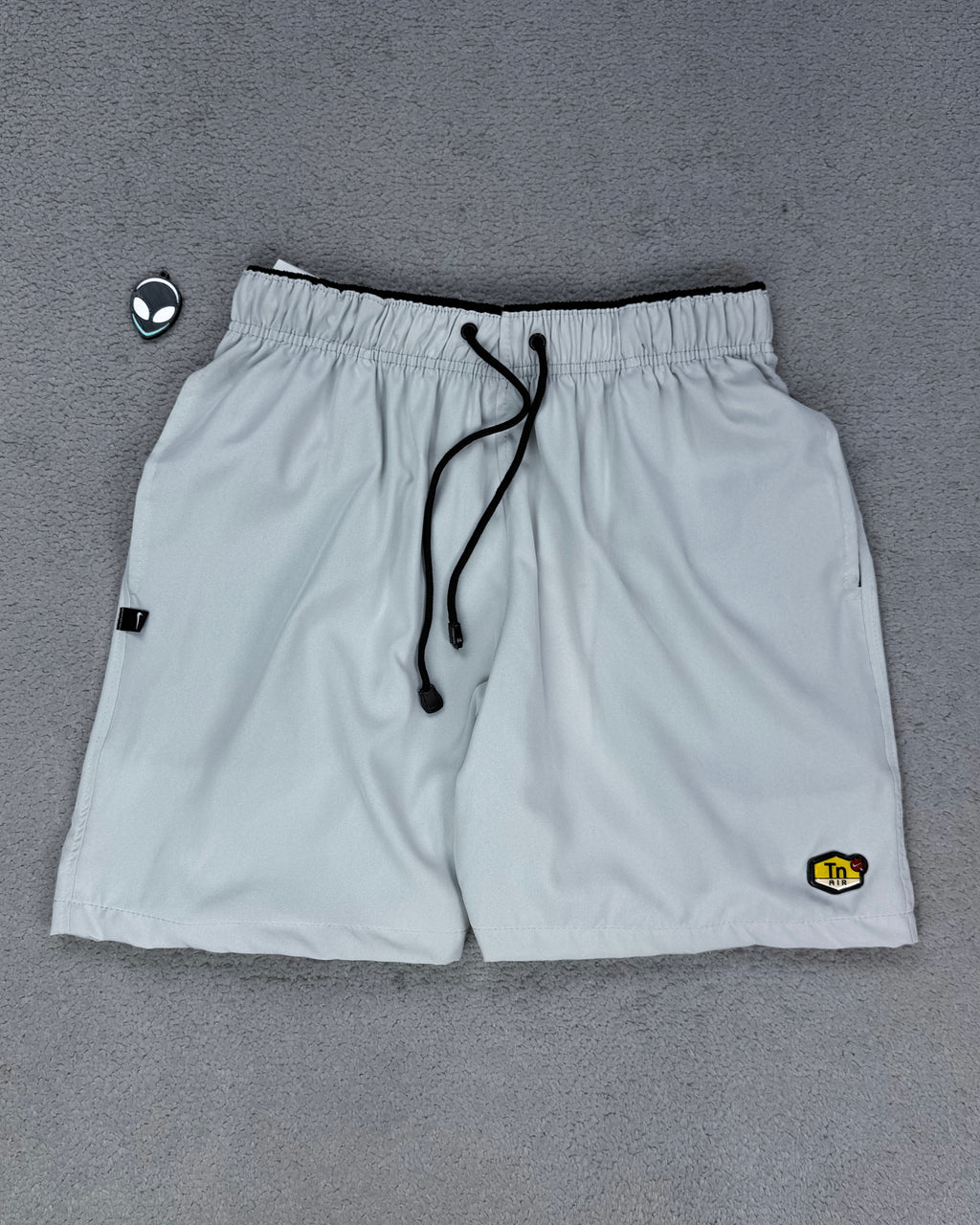 SHORTS DRI FIT NK TN SILICONADO - CINZA